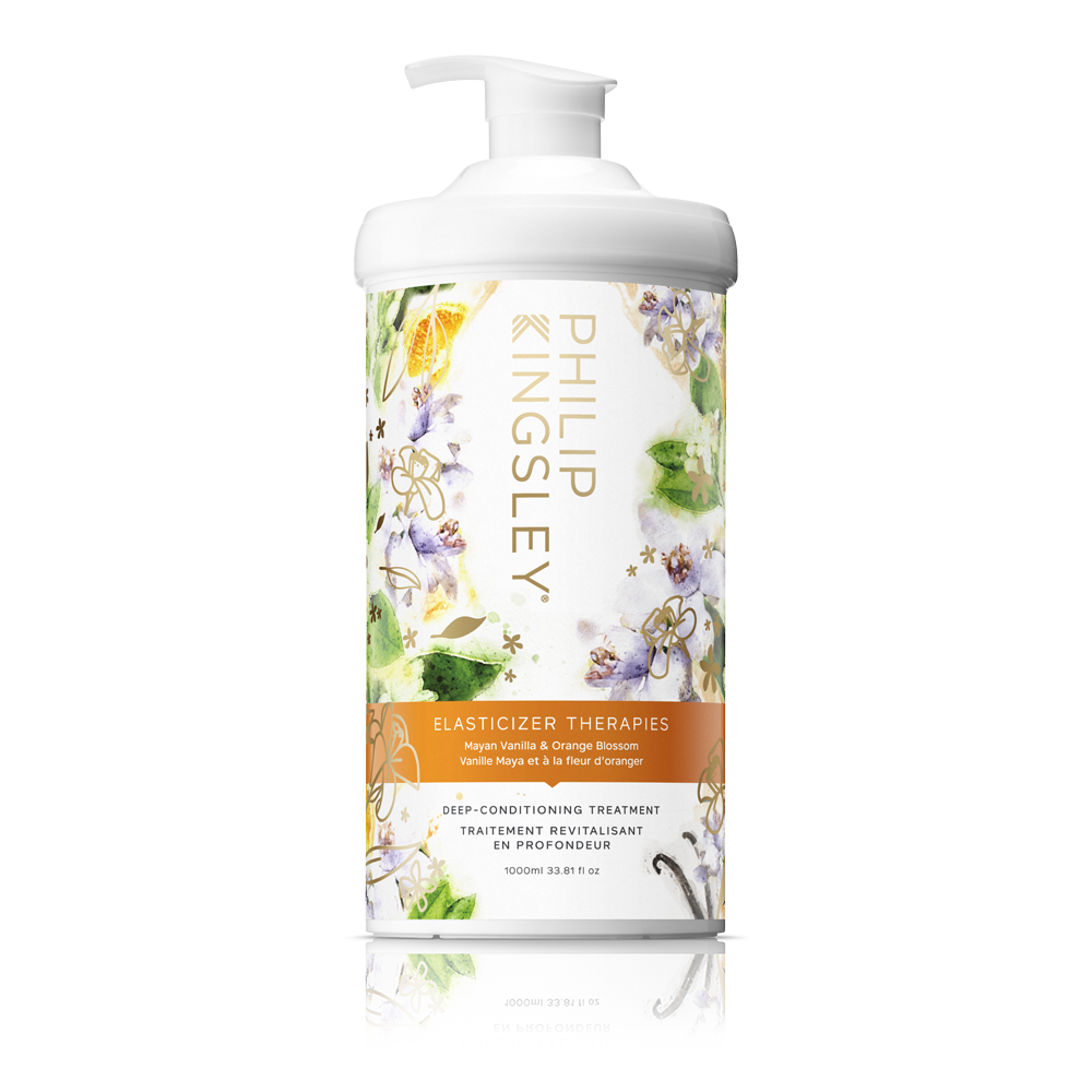 1L of Elasticizer Therapies Mayan Vanilla and Orange Blossom in a pump bottle great for Aromatherapy for its calming and sweet scent.
